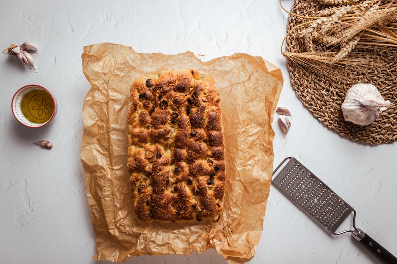 Garlic bread with herbs served fresh from the oven