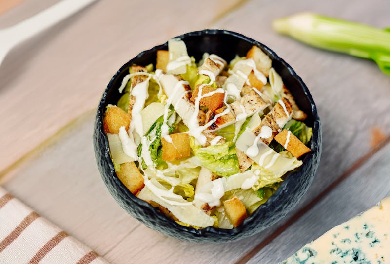 Classic Caesar salad with croutons and parmesan