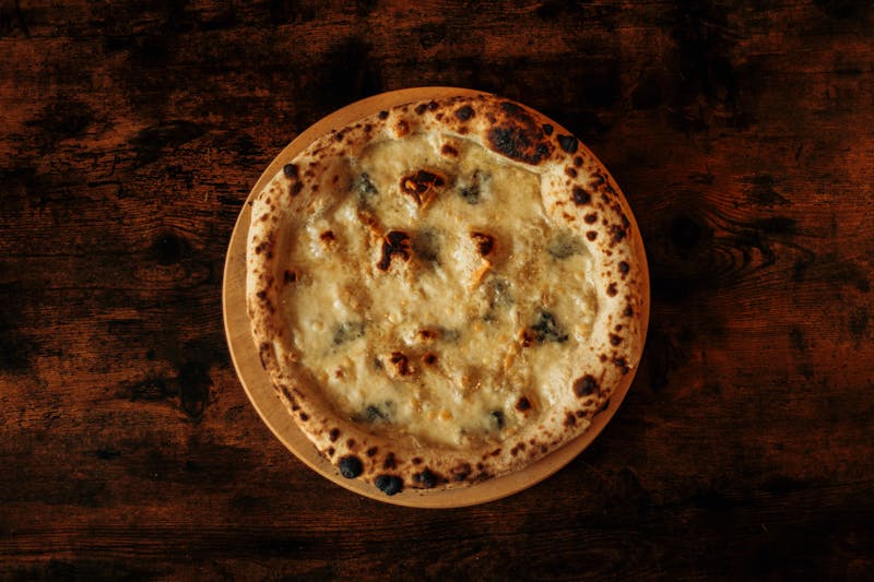 Supreme pizza with assorted vegetables and meats